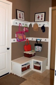 Hang canvas bags from hooks