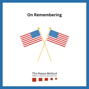 On Remembering. A graphic of two American flags 
