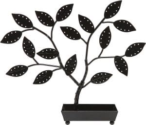 An earring stand that looks like a small tree with little holes on the leaves into which earrings can be placed.