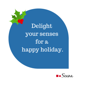 Thought bubble with a sprig of holly in the corner that says Delight your senses for a happy holiday.